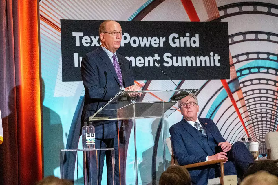 Lt. Gov. Dan Patrick listens as BlackRock CEO Larry Fink speaks at the Texas Power Grid Summit on Feb. 6, 2024, in Houston.