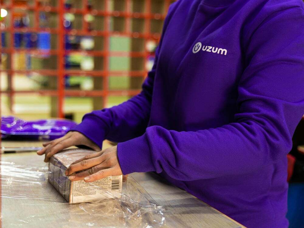 Uzum faces challenges like weak infrastructure, cash-based habits, and the need to educate new digital users.